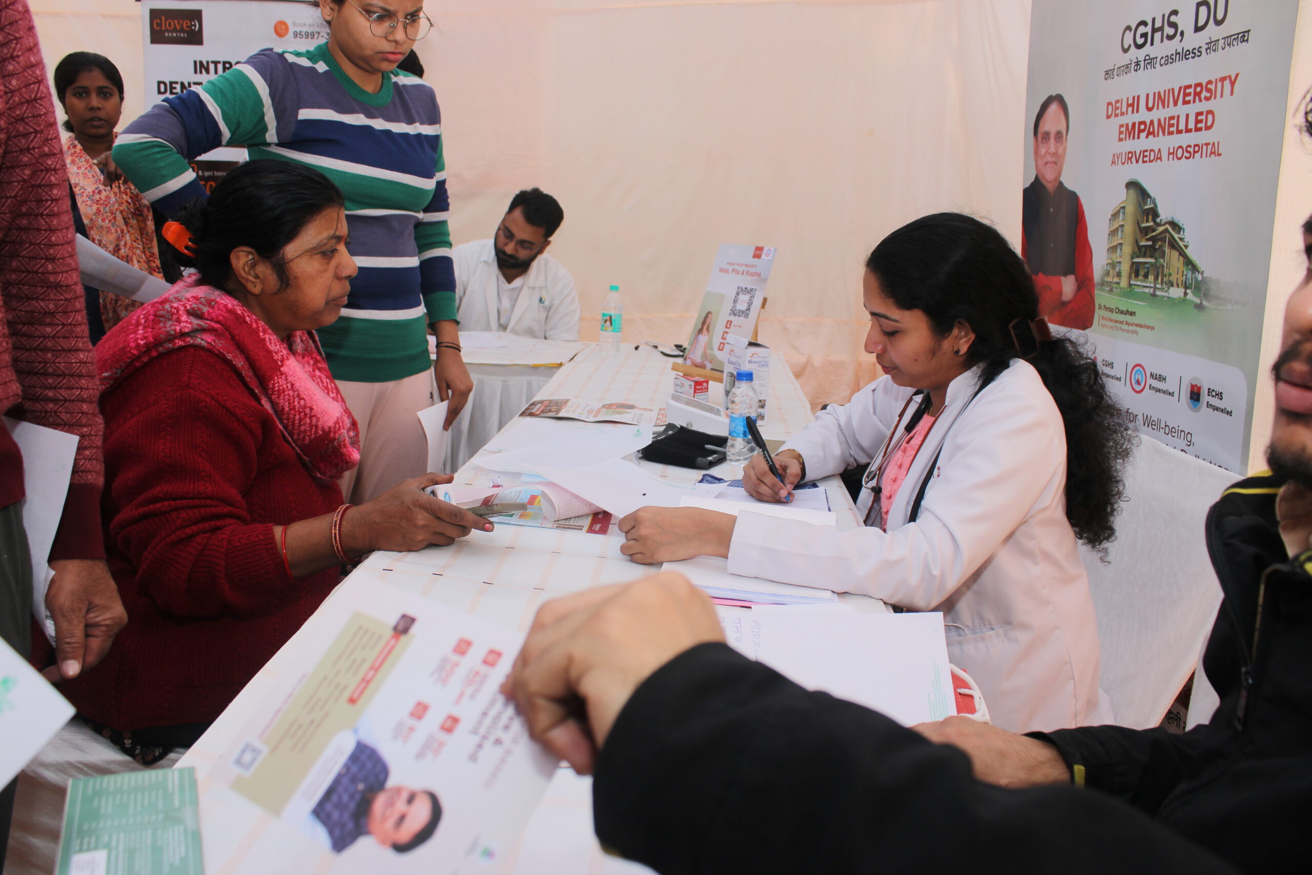 Physicians conducting health screening assessment