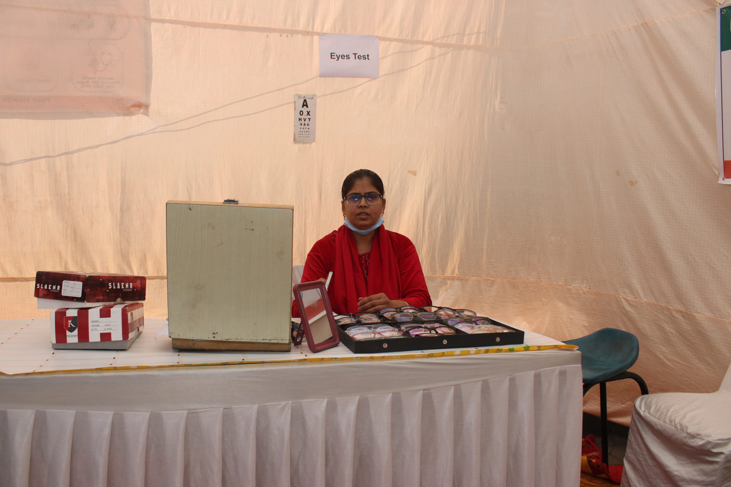 Beneficiaries receiving care at a community event