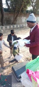 Clothes Distribuion HAFCT Secretary Distributing Old Clothes