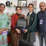 Laptop Distribution to EWS Kids